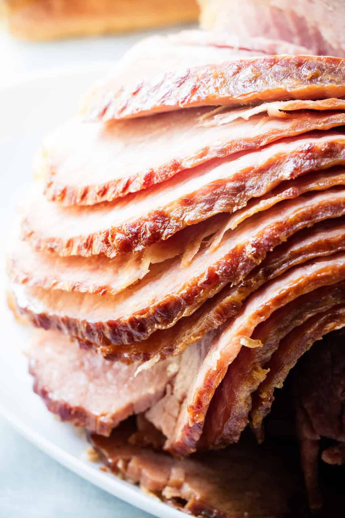 Spiral ham on a white plate.