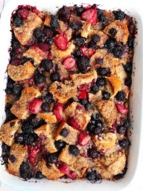 French toast casserole in a white baking dish.