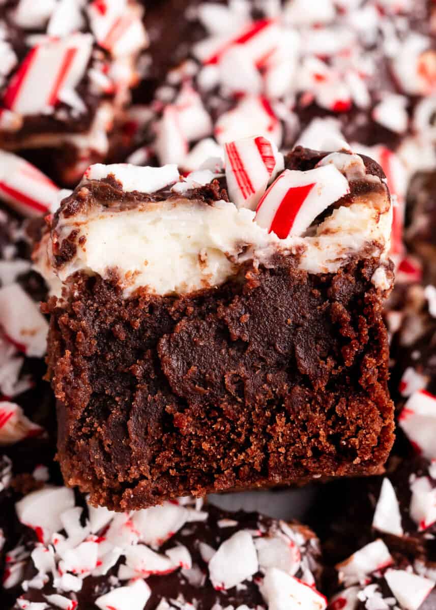 Peppermint brownies sliced with candy canes.