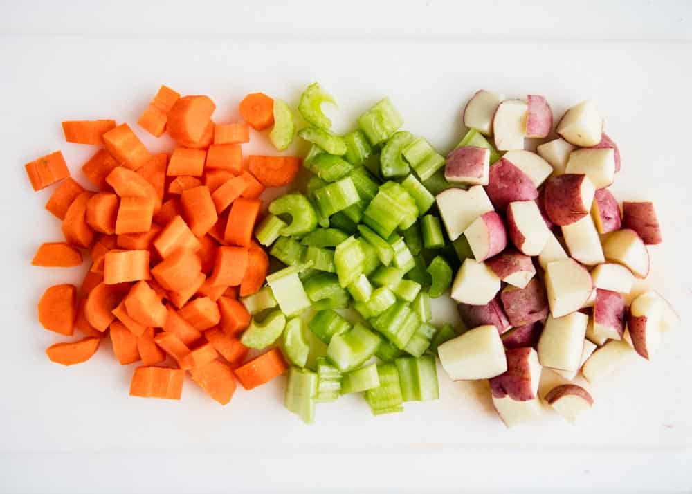 Vegetables cut on cutting board.