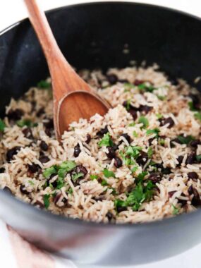 Black beans and rice in a black pot.