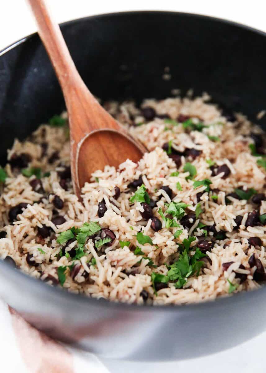 Black beans and rice in a black pot.