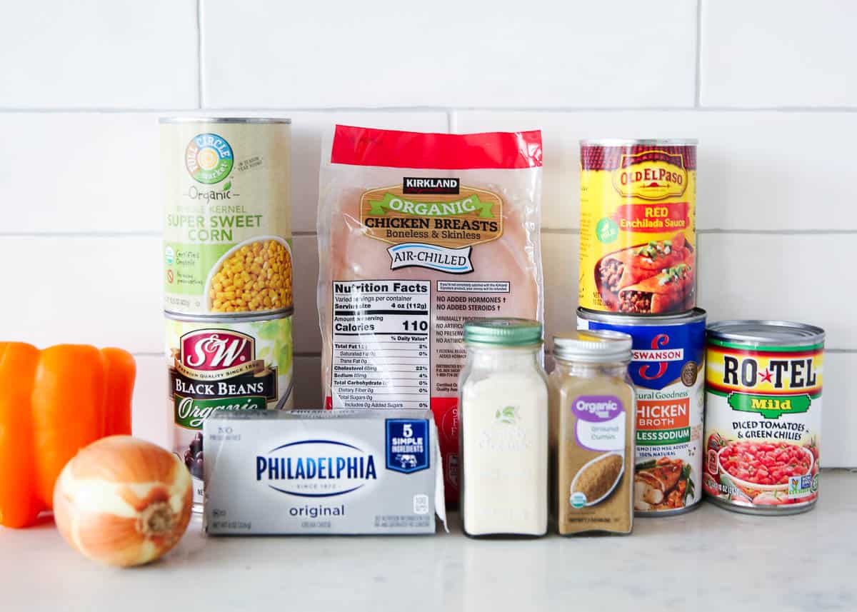 Chicken enchilada soup ingredients on counter.