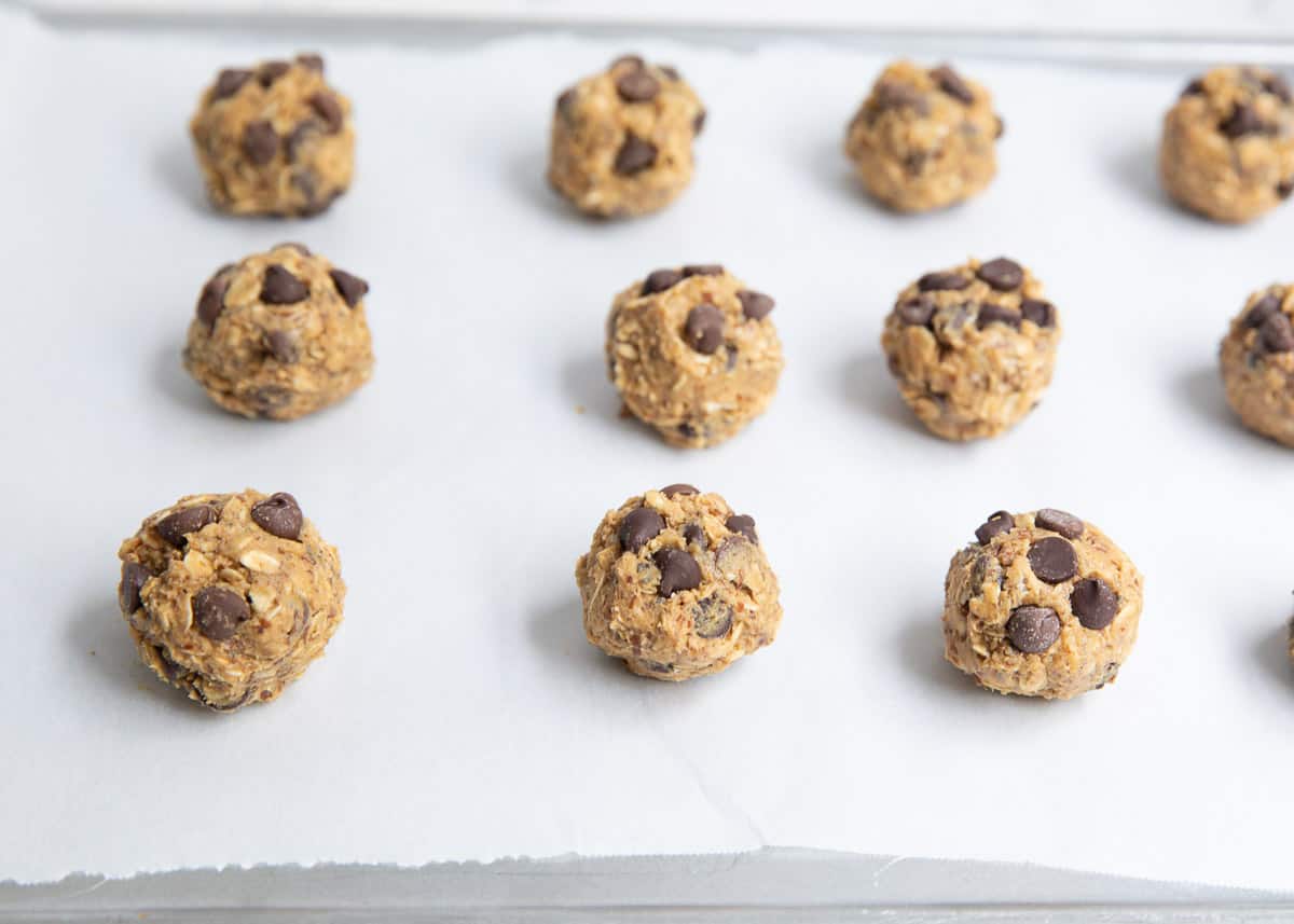 Energy balls on baking sheet.