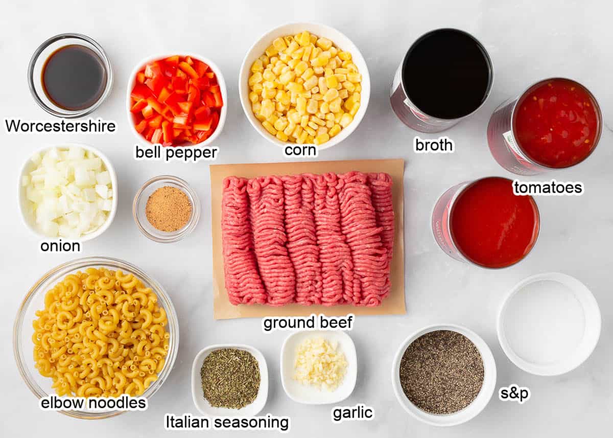 Goulash ingredients on marble counter.