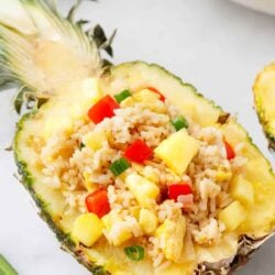 Pineapple fried rice in a cut pineapple.