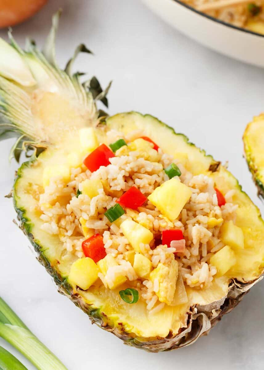 Pineapple fried rice in a cut pineapple.