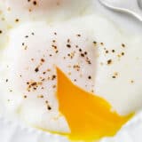 Poached eggs on a plate.