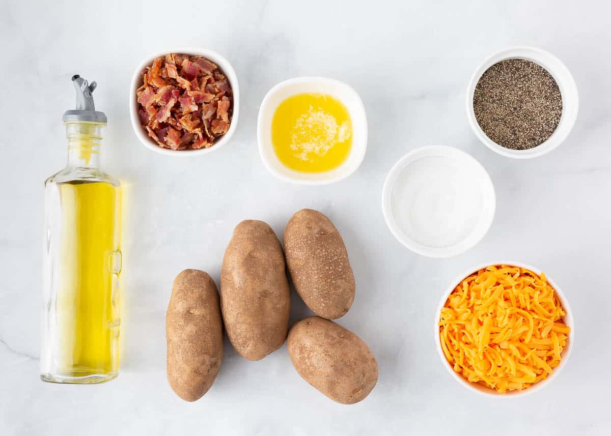 Potato skins ingredients on counter.