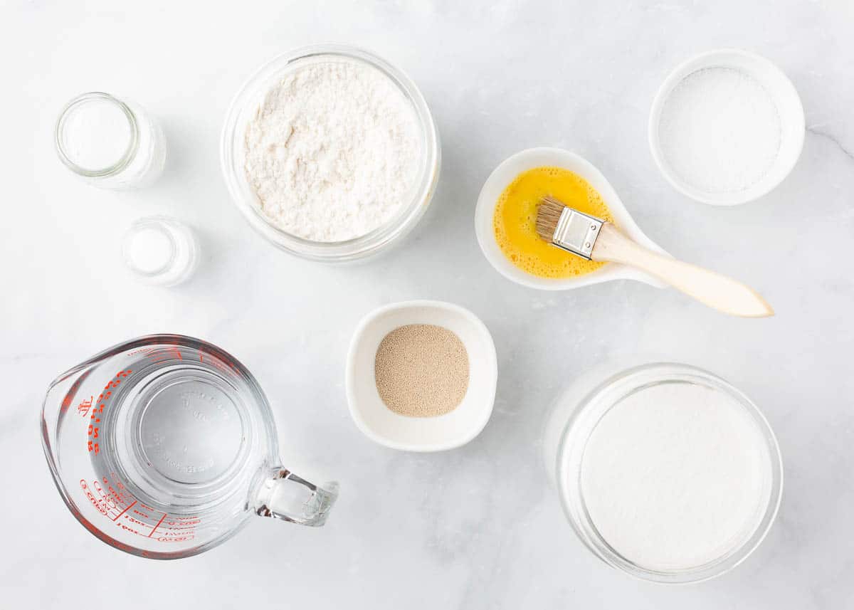 Pretzel bites ingredients on marble counter.