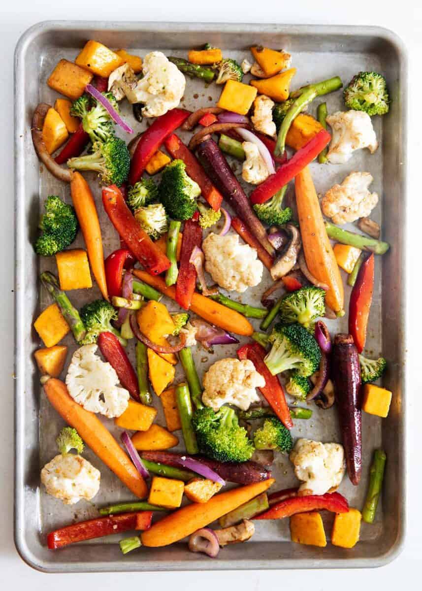 Oven roasted vegetables on a sheet pan.