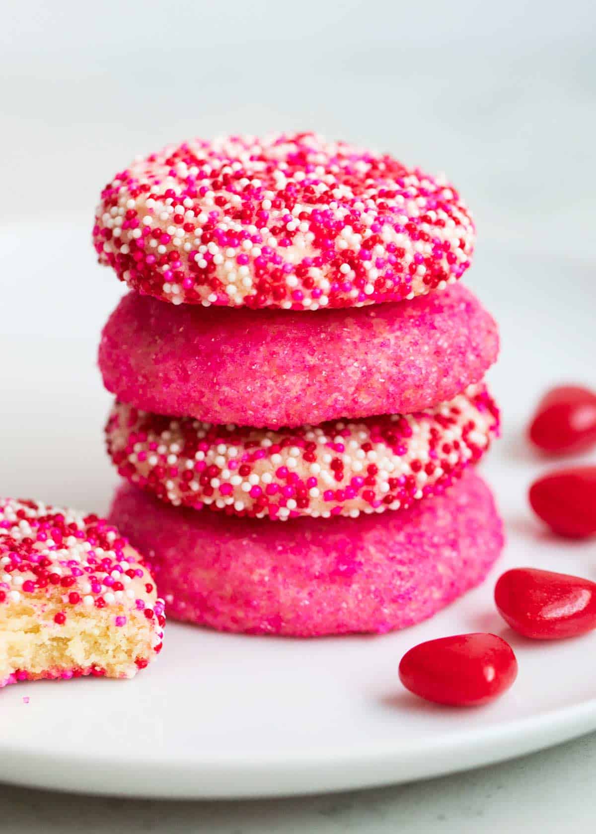 A stack of sprinkled sugar cookies. 