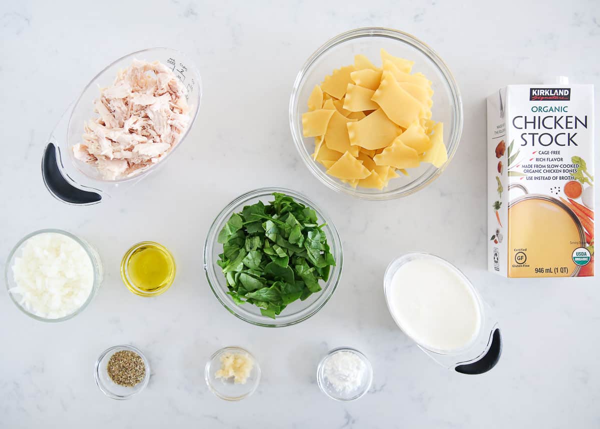 White lasagna soup ingredients on the counter.