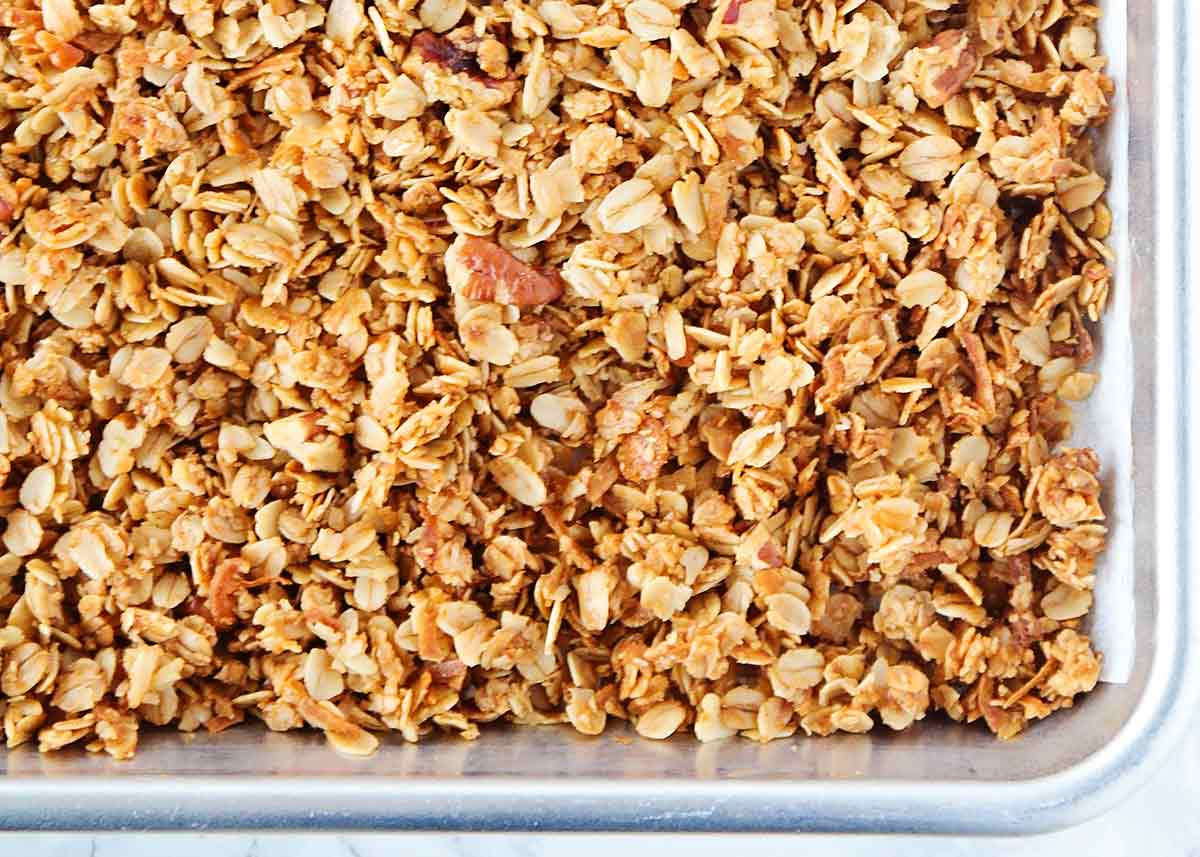 Homemade granola on a baking sheet. 