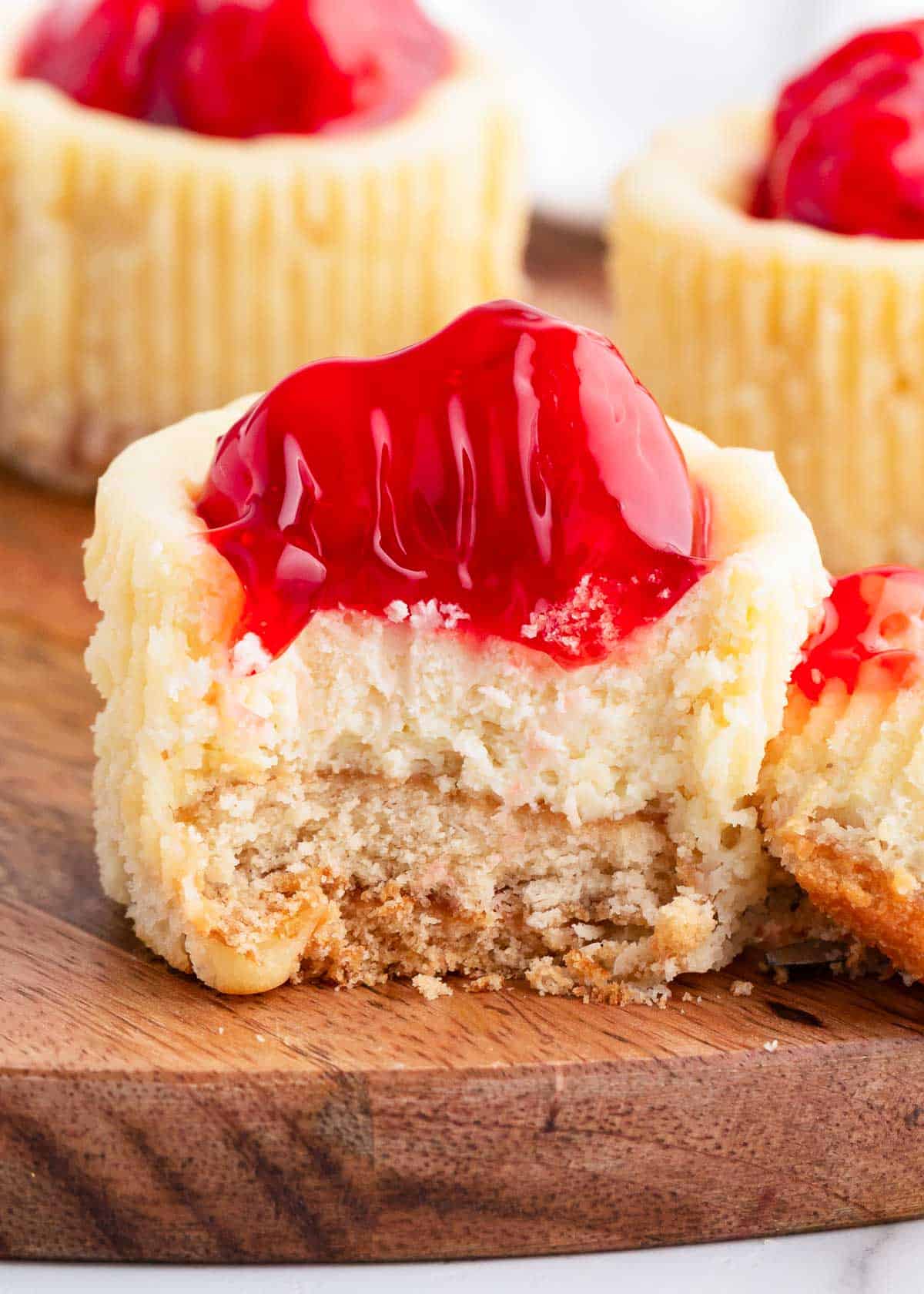 Mini cheesecakes with a bite out of them. 