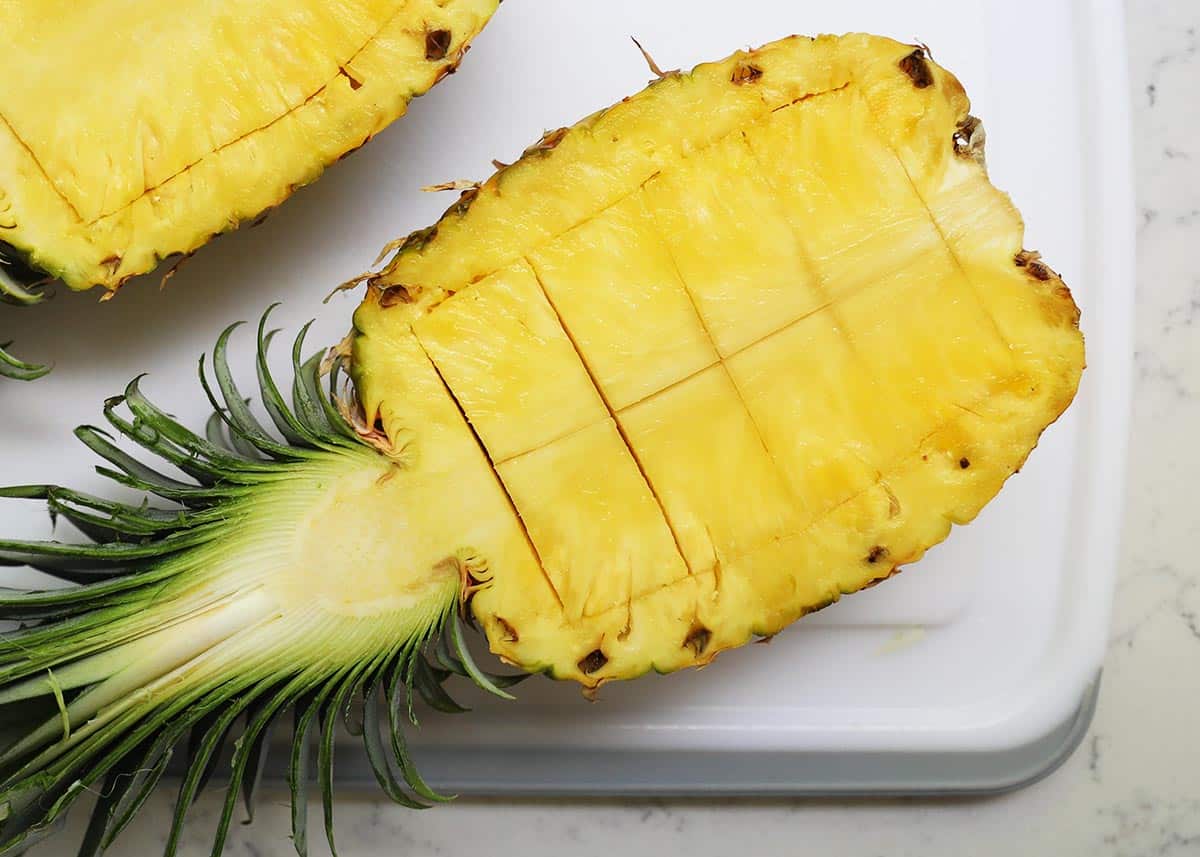 Pineapple on cutting board.