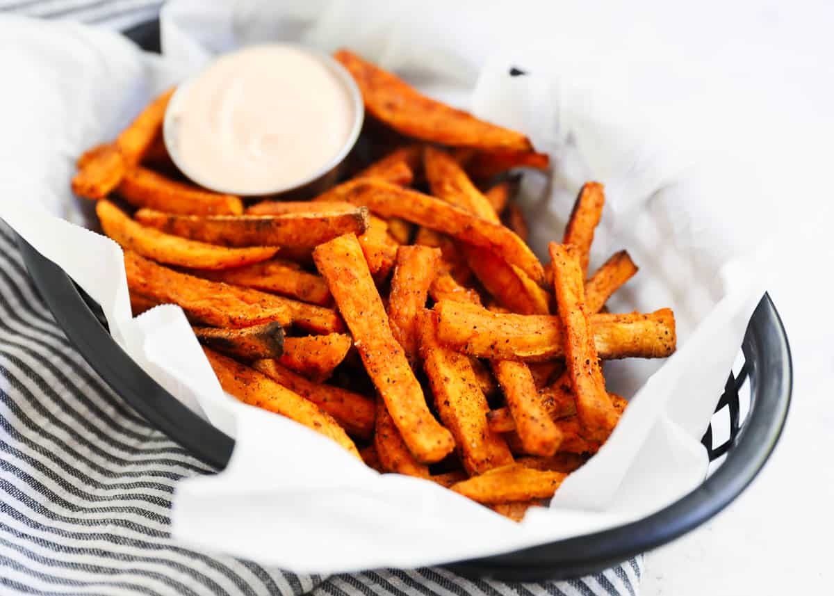 Sweet potato fries in a basket.