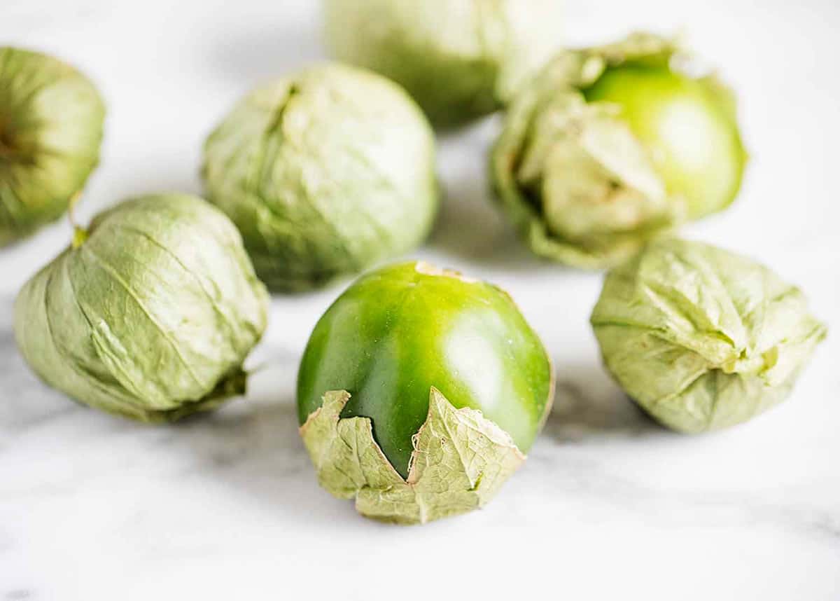 Tomatillos on the counter top. 