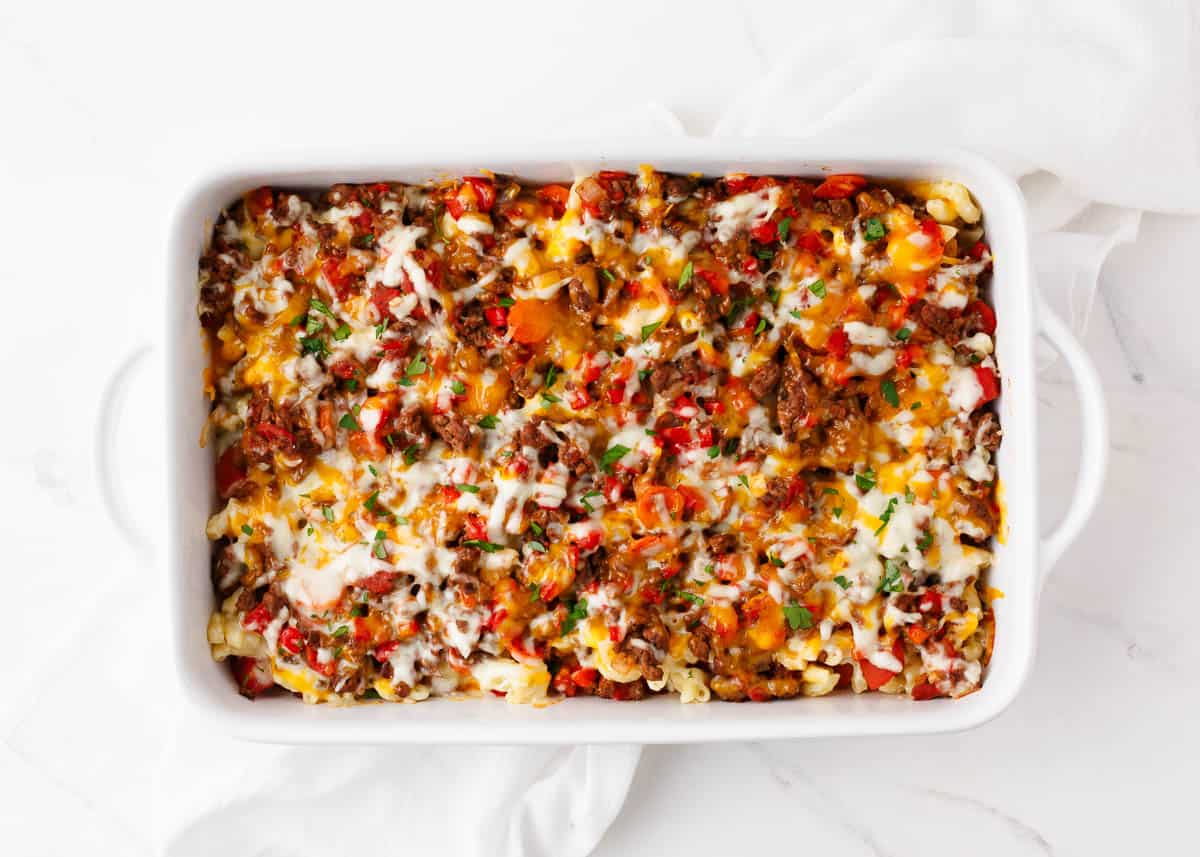 Hamburger casserole in a white baking dish.