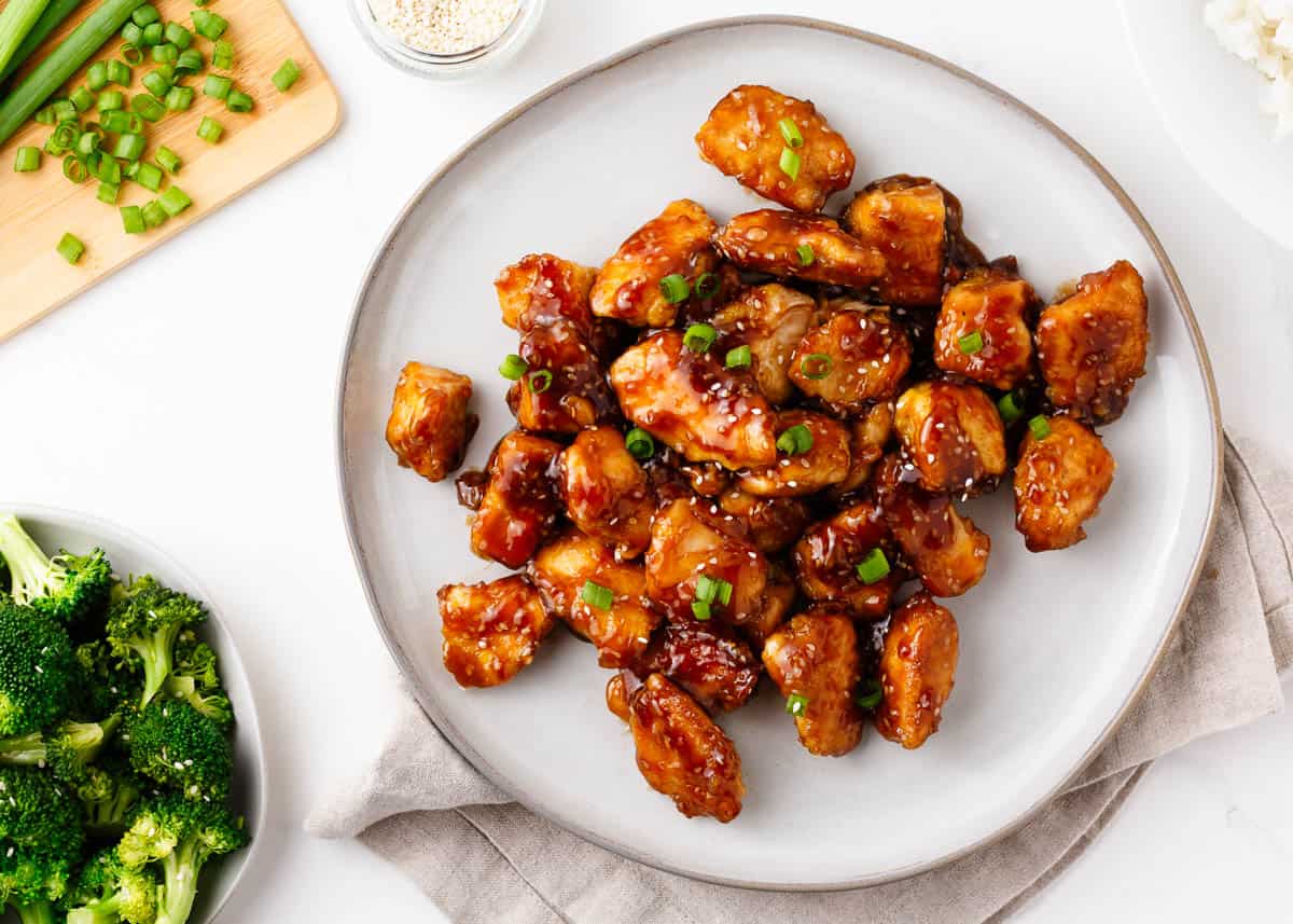 Honey sesame chicken on a plate.