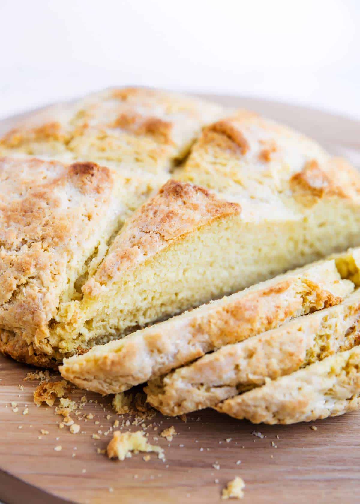 Irish bread sliced up on a white plate. 