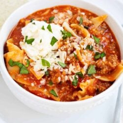 Lasagna soup in a white bowl.