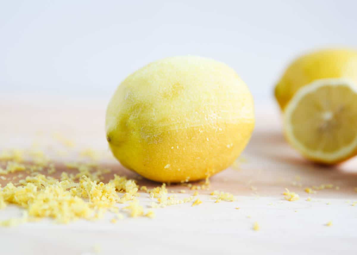 Lemons and lemon zest around it. 
