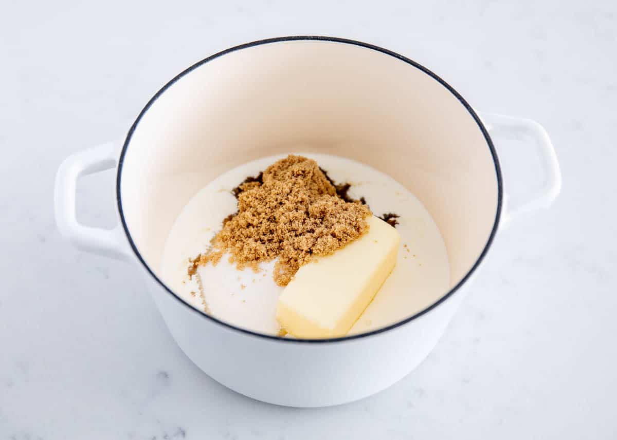 The ingredients to bread pudding sauce in a pot. 