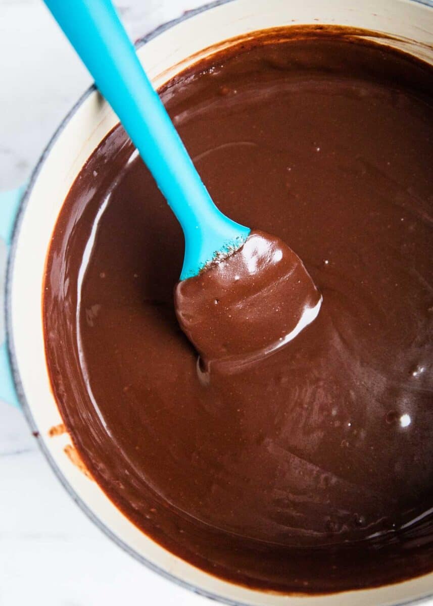 Showing how to make hot fudge in a pot.