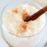 Arroz con leche in a glass cup.