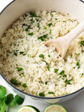 Cilantro lime rice in a white pot.