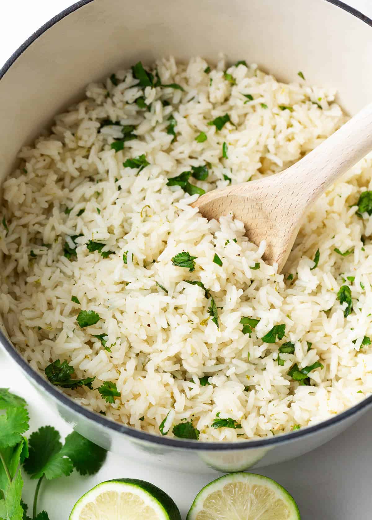 Cilantro lime rice in a white pot.