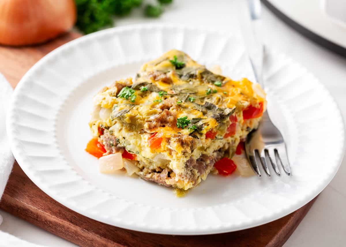 Slice of breakfast casserole on a white plate.