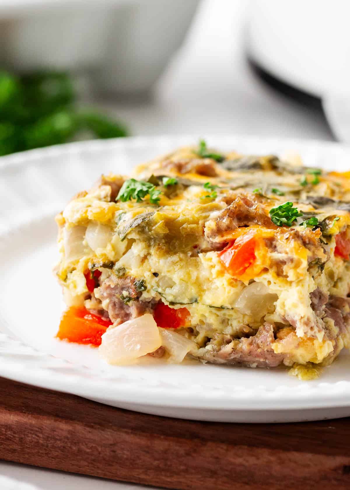 Slice of breakfast casserole on a plate.