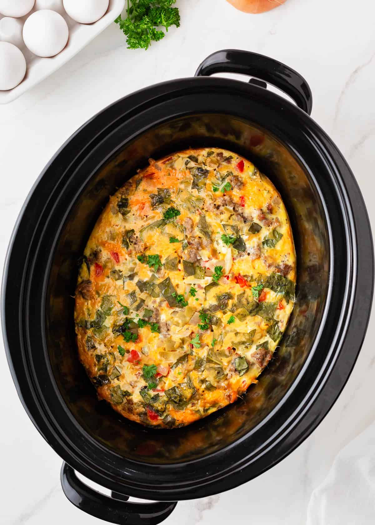 Crockpot breakfast casserole in a pot.
