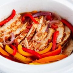 Crockpot chicken fajitas ready to be served from the slow cooker.