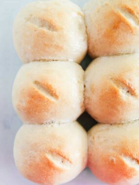 French bread rolls in baking dish.