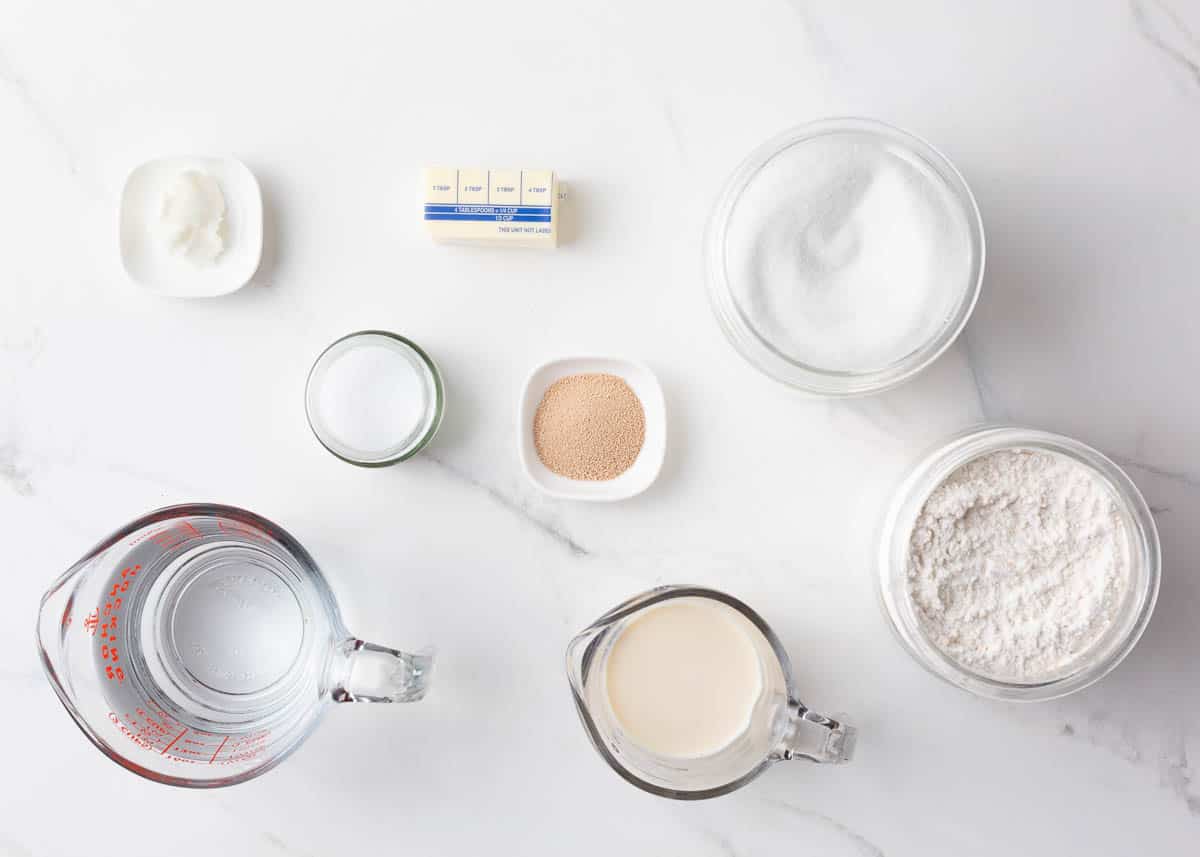 Homemade bread ingredients on counter.