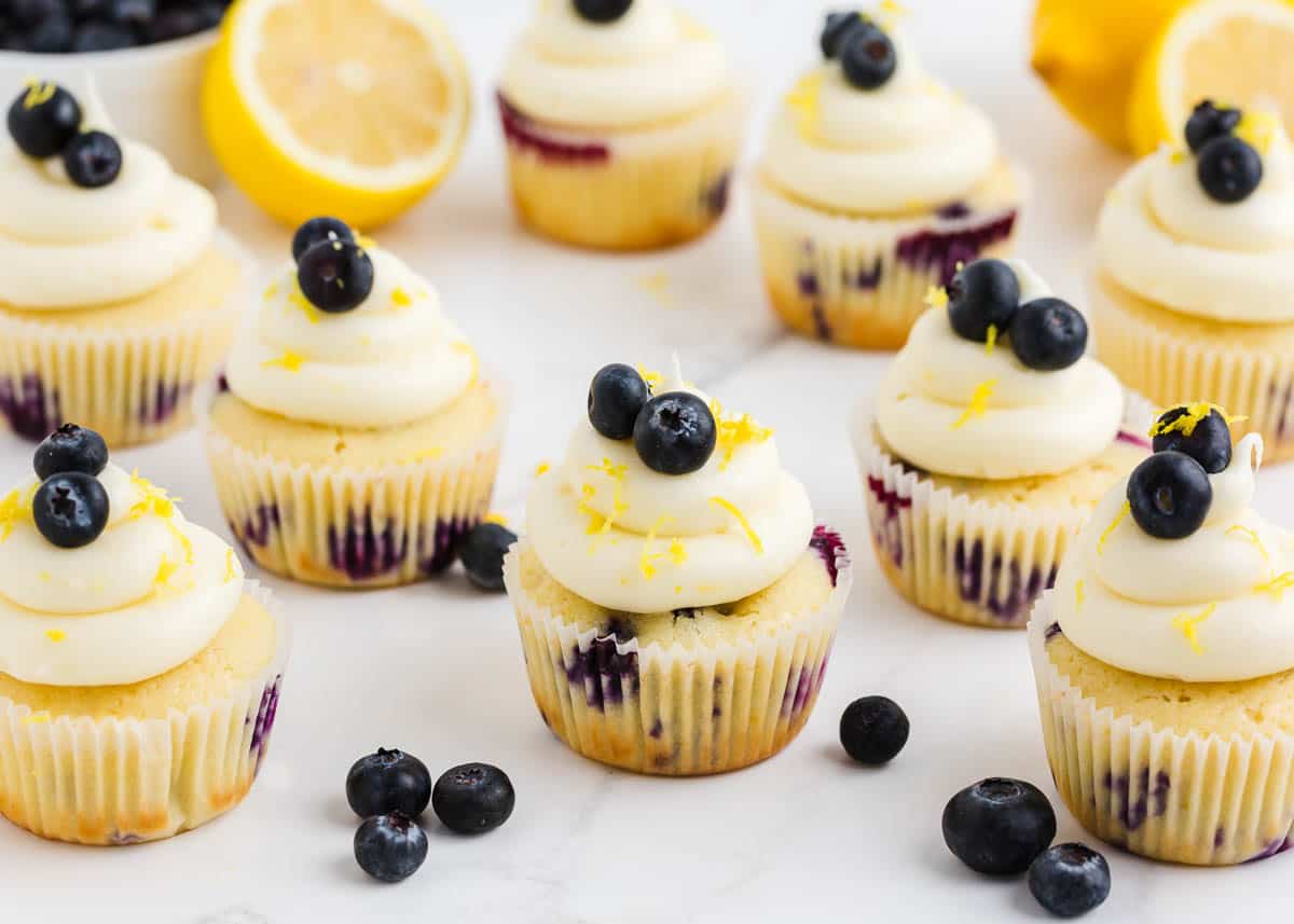 Lemon blueberry cupcakes on the countertops. 