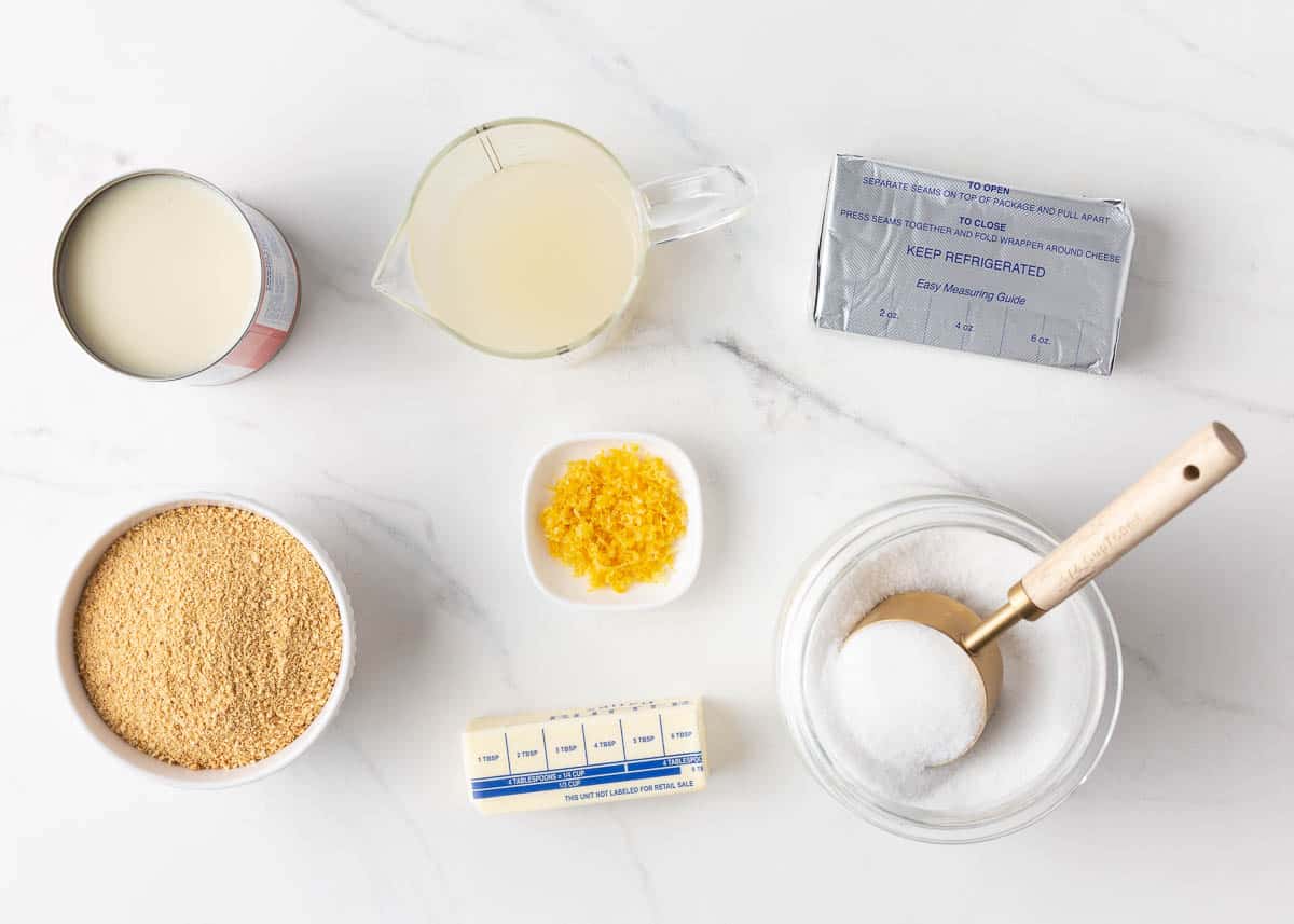 Lemon icebox pie ingredients on counter.