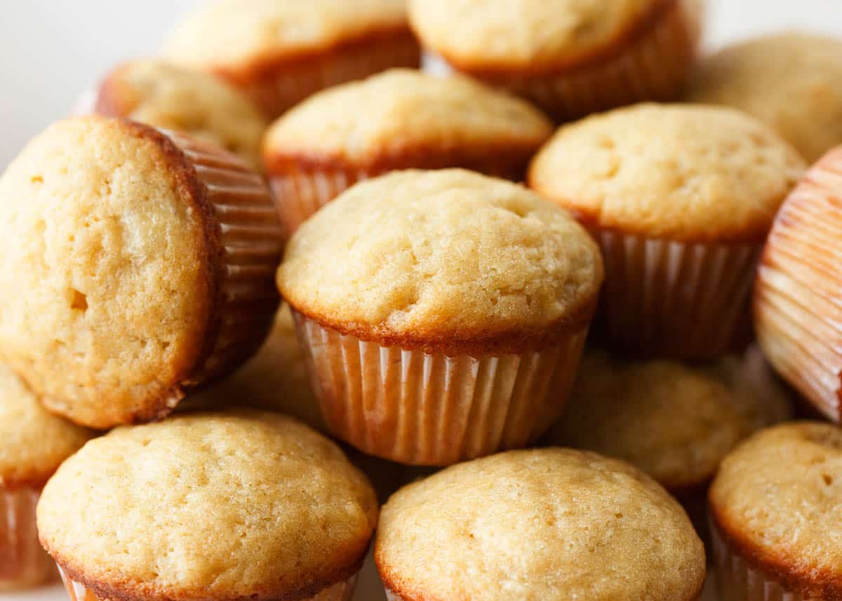 Mini banana muffins stacked on each other.