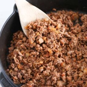 Taco meat in a cast iron skillet.