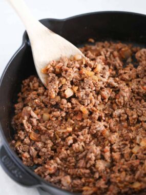 Taco meat in a cast iron skillet.