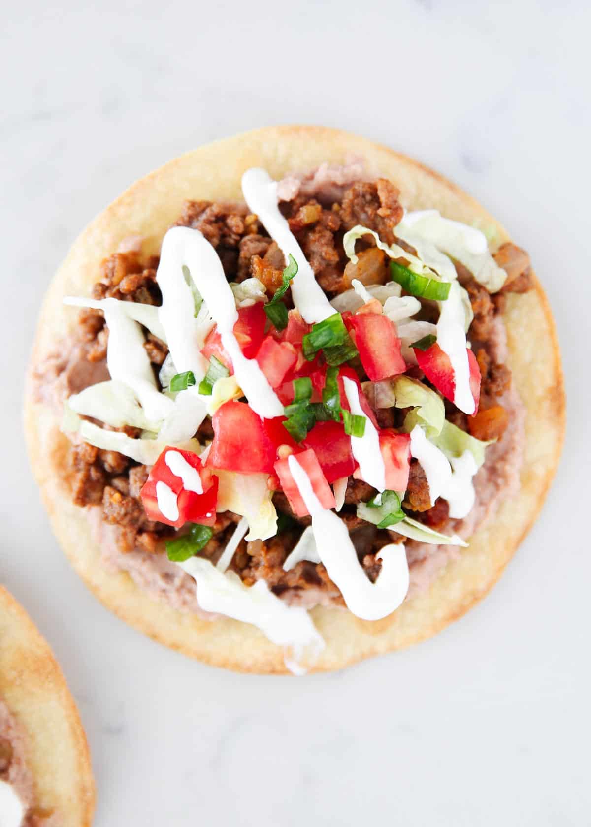 Tostada on marble counter.