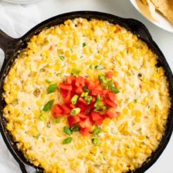 Corn dip in a cast iron skillet.