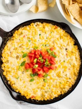 Corn dip in a cast iron skillet.