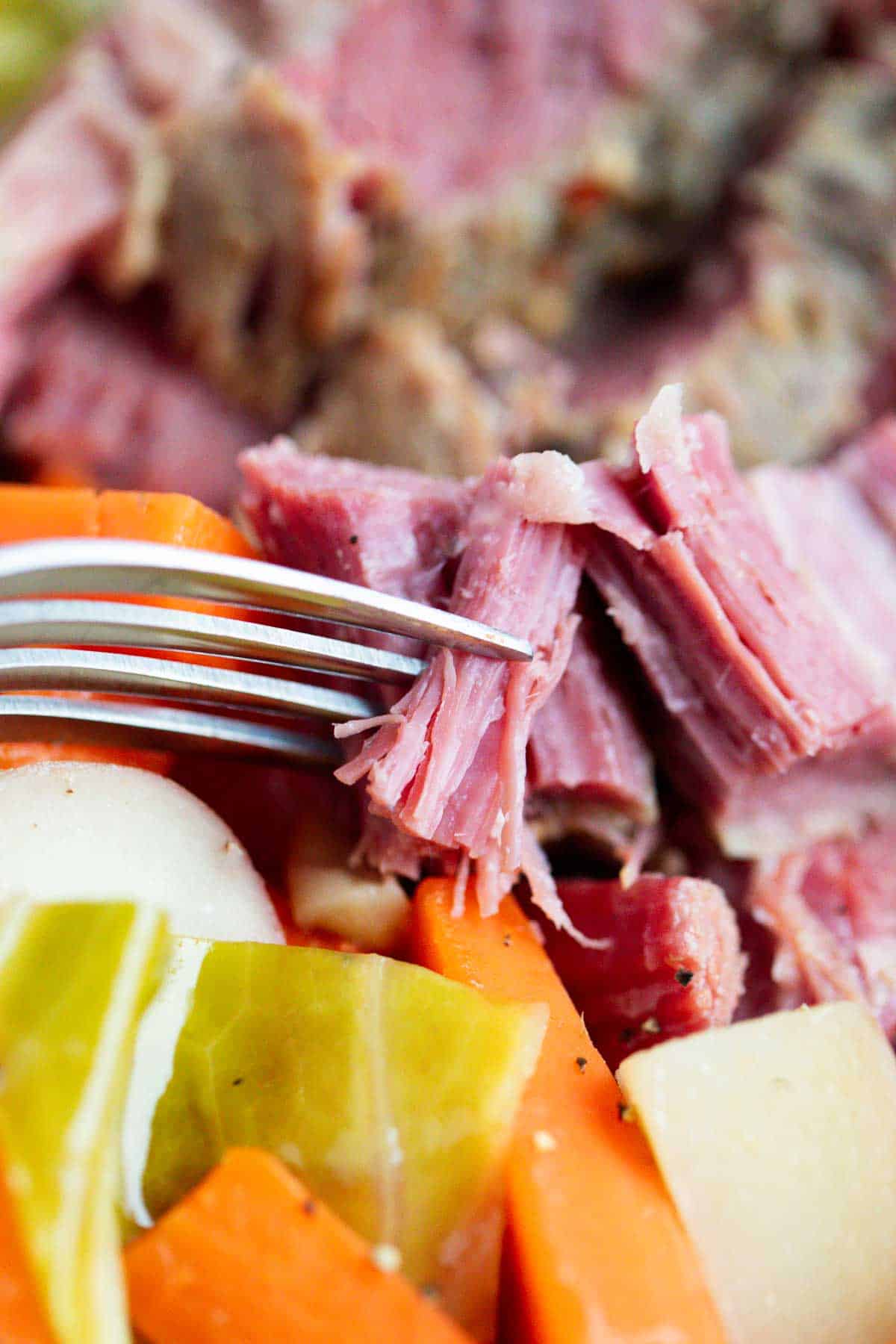 Corned beef and cabbage on a plate. 