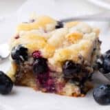 Slice of blueberry coffee cake.
