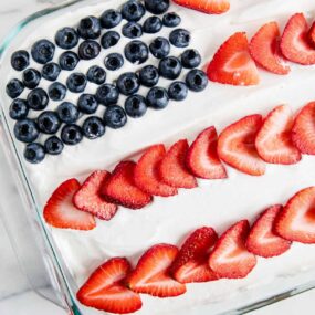 American flag poke cake in baking dish.