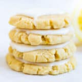 A stack of lemon cookies with lemon glaze.